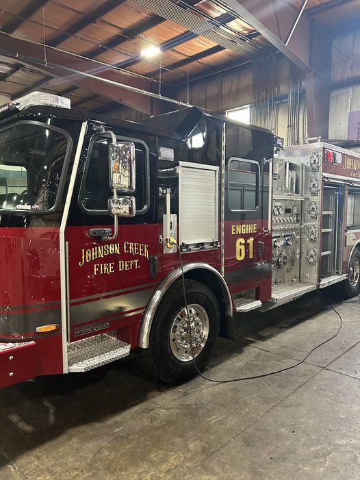 Red and Gold Johnson Creek Fire Engine number 61